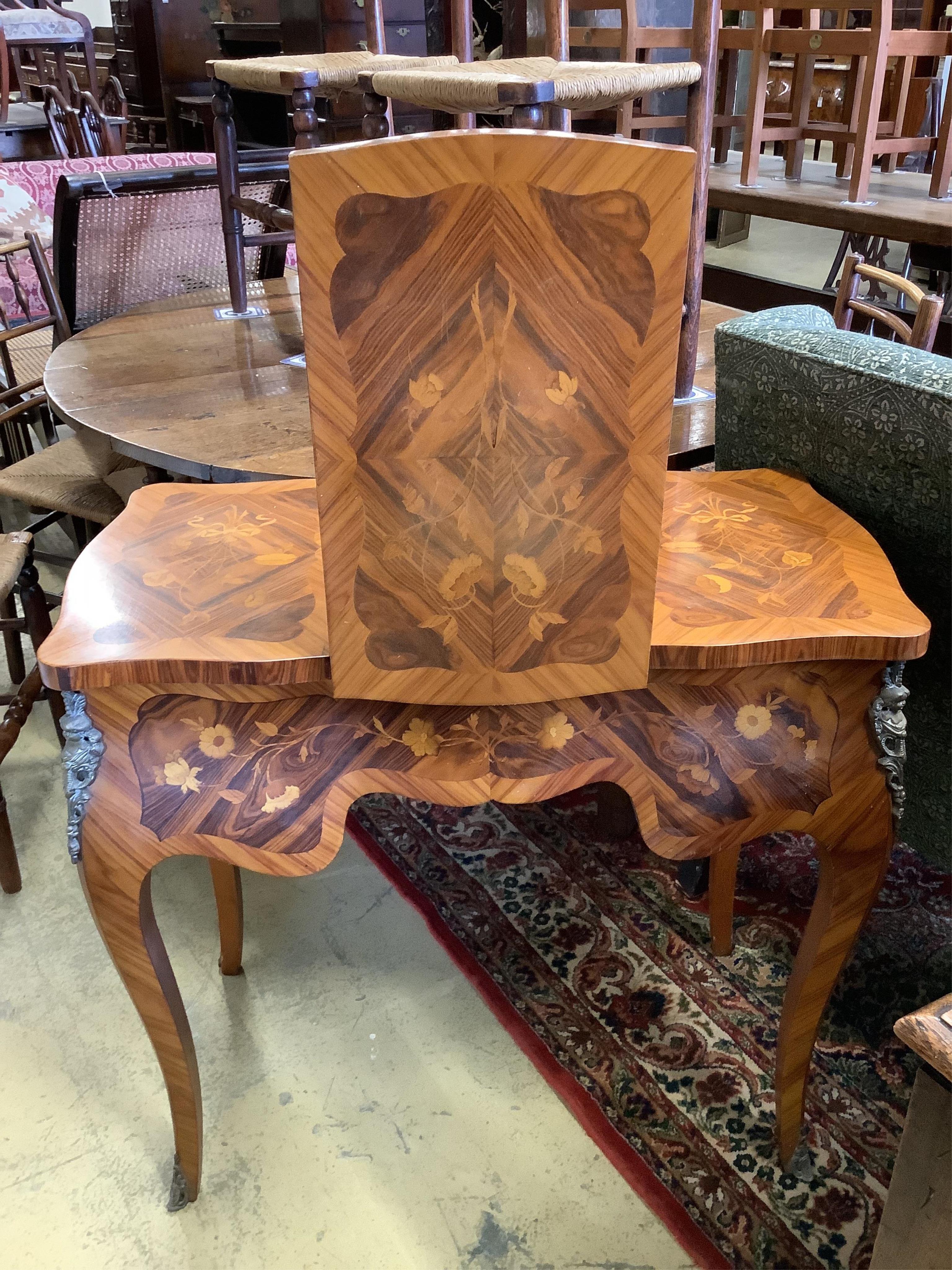 A French marquetry inlaid kingwood poudreuse, width 82cm, depth 36cm, height 74cm. Condition - good